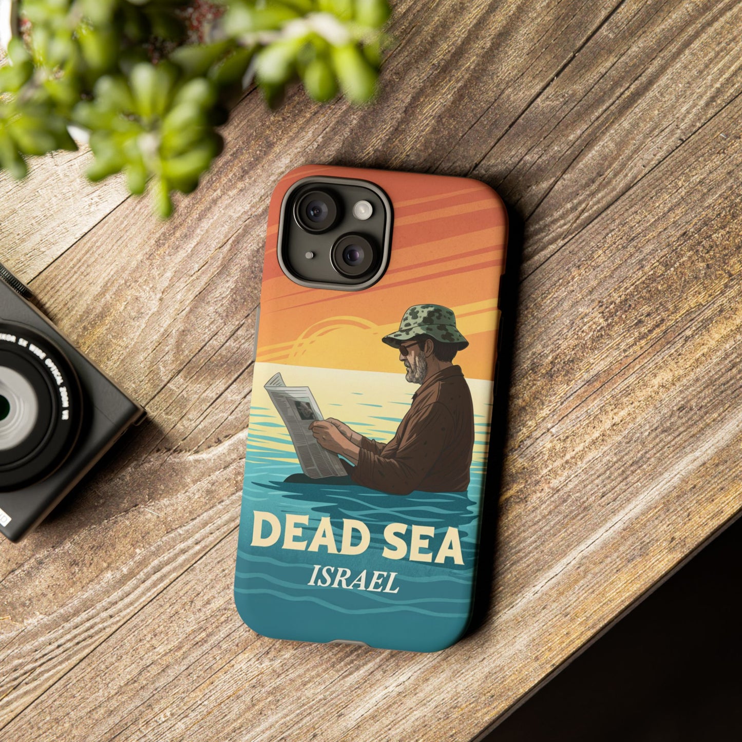 Dødehavet – Solnedgang og Flytende Mann Mobildeksel